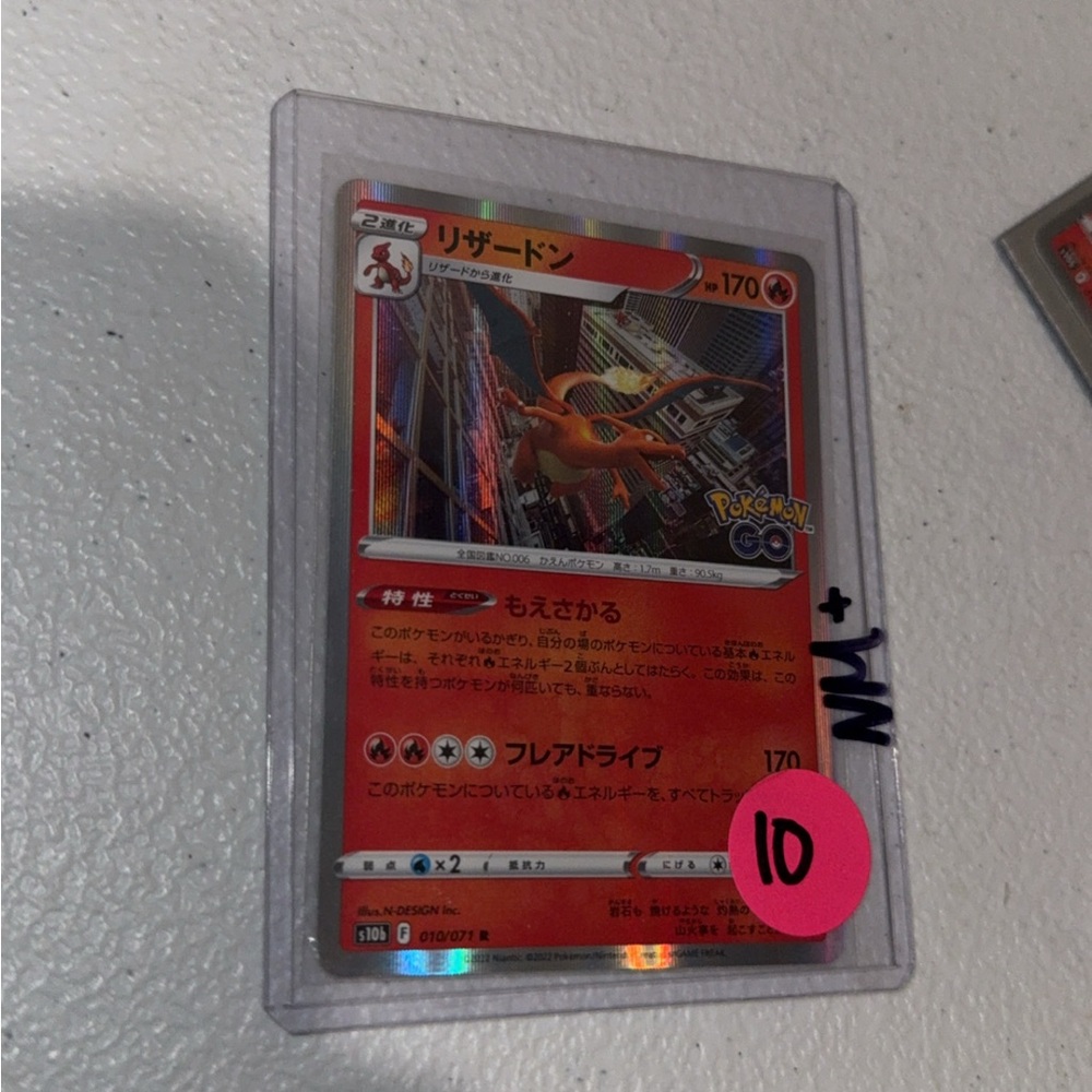 Pokemon Charizard Trading Card - Red and Orange